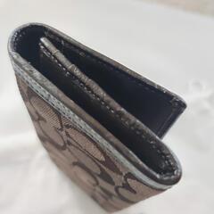 COACH折り財布　シグネチャー織柄の画像