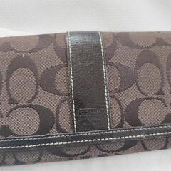 COACH折り財布　シグネチャー織柄の画像