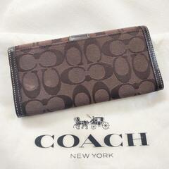 COACH折り財布　シグネチャー織柄の画像