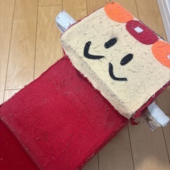 牛乳パックで作ったアンパンマン風の乗り物の画像