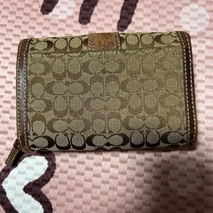 coachミニ財布の画像
