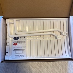 エアコン風除けカバー　新品の画像