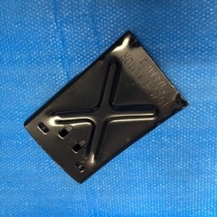 中古工具タイヤホイルレンチと車止めの画像