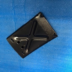 中古工具タイヤホイルレンチと車止めの画像