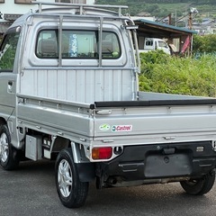 ◎H21年EBD-TT2 ◎サンバートラックＴＣハイルーフ4WD ◎5速マニュアル ◎エアコンパワステ付き◎車検9年06月 パワーウィンドウ ◎キーレスの画像