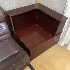 応接セットのソファとコーナー収納の画像