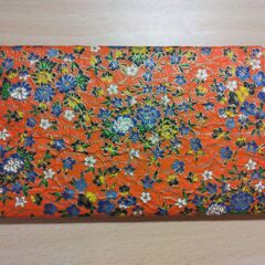 小物入れ　オレンジ×花の画像