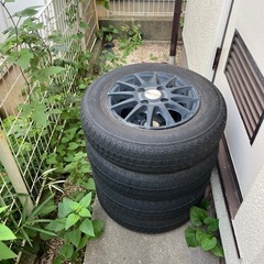 145/80/12 中古アルミホイール　4穴　
タイヤ付 の画像