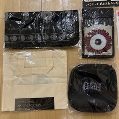 GLAYのCDやDVDについてきたステッカー（シール）、函館で昔購入したラッキーピエログッズ、ライブの銀テープなどの画像