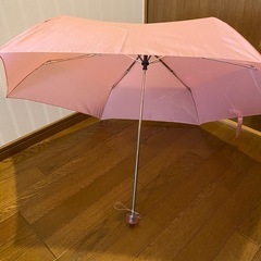 新品未使用　ピンクの折り畳み傘の画像