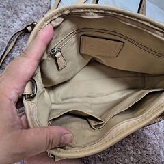 COACHピンクのミニショルダーの画像