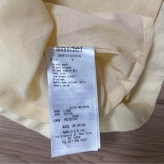 スナイデル　イエローノースリーブAラインワンピース　リネン　コットンの画像