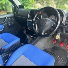ジムニー　‼️ミッション‼️長車検‼️カスタム多数‼️青/黒 SUV オフロード改造車の画像