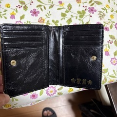 【流儀圧搾製】オシャレな二つ折り財布の画像