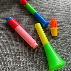 子ども用笛とラッパとカスタネットと音のなるおもちゃの画像