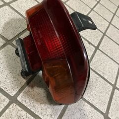 AF27/AF28　　スーパー ディオ　中古リアウインカーテールレンズの画像