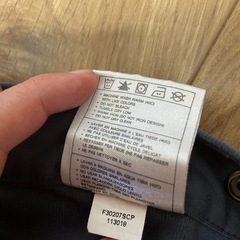 Nike グレー ジャージパンツ スナップボタン付きの画像