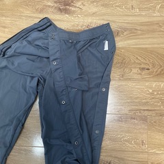 Nike グレー ジャージパンツ スナップボタン付きの画像