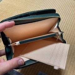 緑色お財布の画像