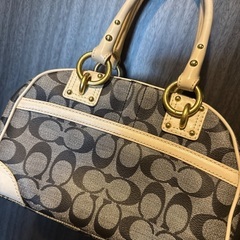 7月末で搭載終了　COACH バックの画像