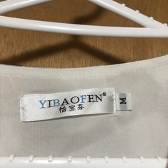 「女性限定」ブラウスの画像