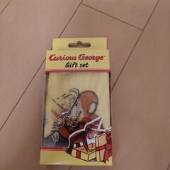 おさるのジョージのカップとミニハンカチのセットの画像
