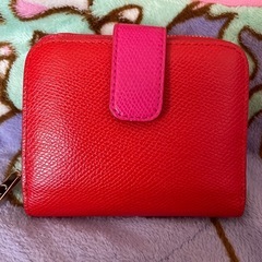 COACH二つ折り財布の画像