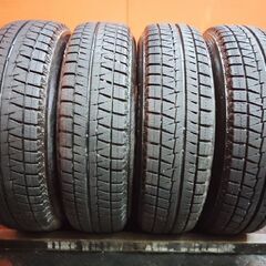 走行短め【BS BRIDGESTONE ICEPARTNER2 165/70R14】スタッドレス【BS BALMINUM 14インチ 5.5J4HPCD100+39】22年製 ヴィッツ等　(KTM442)の画像