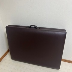 持ち運び可　折りたたみ施術ベッドの画像