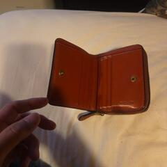 コ－チの二つ折の財布の画像