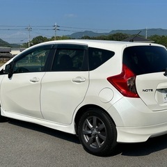 【㊗️ご成約🎊】《平成25年式日産 ノート 希少 AUTECH エアロスタイル☆少走行63,450km！☆少々難ありのため格安投稿です！☆地デジフルセグナビ☆Bluetooth☆バックモニター☆ドライブレコーダー☆スマートキー☆H.I.D☆フォグ☆ETC☆15インチアルミホイールの画像