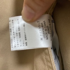 ベージュトレンチコートの画像