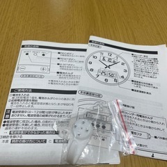 電波かけ時計　ゴールドの画像