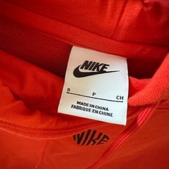 NIKEオレンジ色パーカーの画像