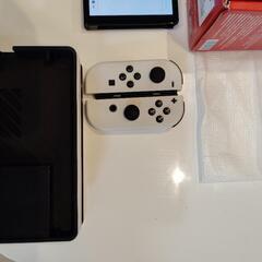 壁掛けテレビとスイッチ有機ELセットの画像