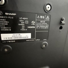 テレビとテレビボード(リモコン付)の画像