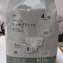 ケアフィール しっかりフィット Mサイズ 大人用オムツ 開封済みの画像