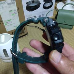 値下げ腕時計商談中の画像