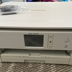 壊れた？プリンターと未使用インクの画像