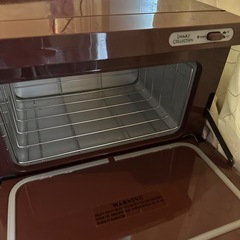 タオルウォーマー茶色の画像