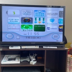 wii本体2台、太鼓の達人2台、wiiフィットボード、ソフト16本の画像