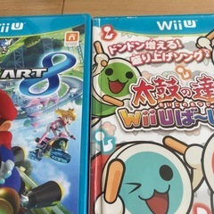 wii本体2台、太鼓の達人2台、wiiフィットボード、ソフト16本の画像