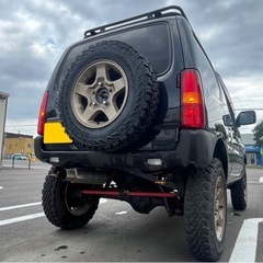 JB23W ジムニー❗️3型❗️AT❗️リフトアップ❗️M/Tタイヤ❗️社外マフラー❗️ミラーウインカー❗️の画像