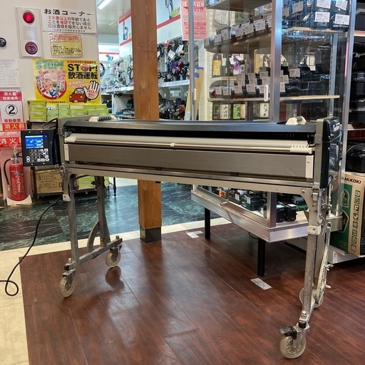 極東産機　primeREVOⅡ 糊付け機