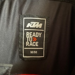 KTM レザー革ツナギ ブラック/オレンジの画像