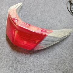 シグナスX2012世代の純正テールランプカバーの画像