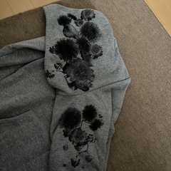 新品タグ付きロングパーカーの画像