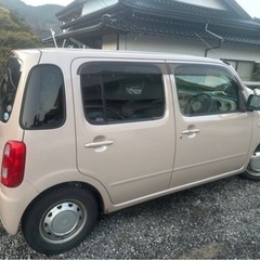 ピンクの ミラココア4wd車検たっぷりの画像