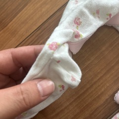 足付きロンパースの画像
