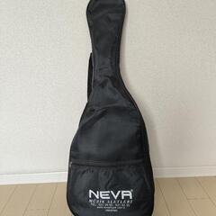 トルコブルーのアコースティックギターの画像